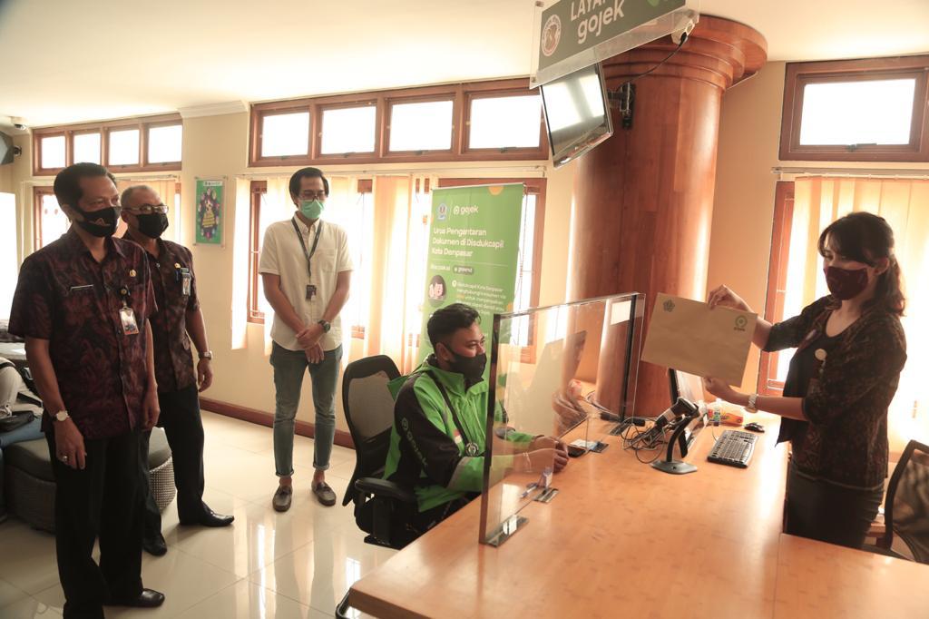 Kerjasama antara Disdukcapil Kota Denpasar dengan Gojek